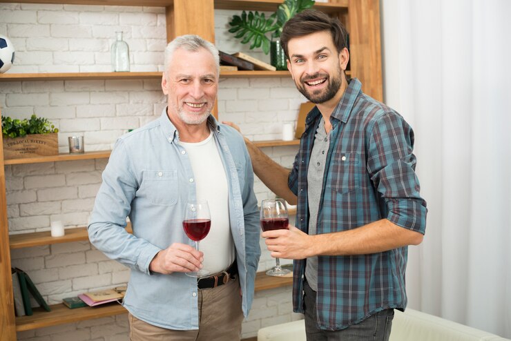 aged-man-young-smiling-guy-with-glasses-wine_23-2148030371