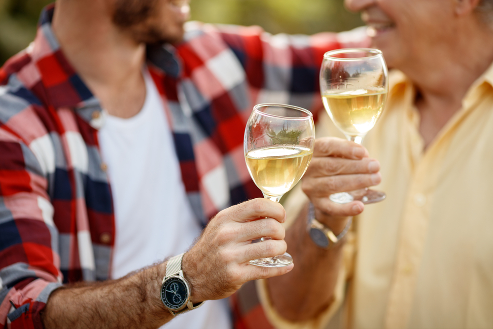 White,Wine,In,Wineglass,-,Successfully,Harvesting,Grapes